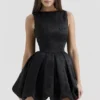 Melika Black Backless Embroidered Mini Puffball Dress
Melika Black Backless Embroidered Mini Puffball Dress