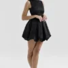 Melika Black Backless Embroidered Mini Puffball Dress
Melika Black Backless Embroidered Mini Puffball Dress