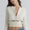 Mistle-Bow Cream Jacqard Wool Cardigan