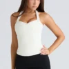 The Peekaboo Ivory Halter Neck Corset Top