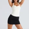 The Peekaboo Ivory Halter Neck Corset Top